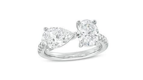 Kleinfeld® x Zales 2-3/8 CT. T.W. Certified Oval and Pear-Shaped Lab-Created Diamond Engagement Ring in Platinum (F/VS2) $11,119.00 Variations Available.
