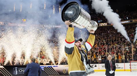 Knights hockey. FILE - Vegas Golden Knights right wing Mark Stone (61) skates with the Stanley Cup after the Knights defeated the Florida Panthers 9-3 in Game 5 of … 