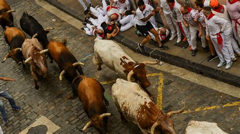 Knocks, hard falls: Thousands -- including Americans -- take part in Spain's running of the bulls