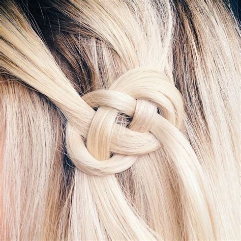 Knots in hair. 1. A Bun Never Goes Out of Style. Photo Credit: Pinterest. If you don't want hair all over the place, you can tie your knotless braids in a bun. A bun is one way to make knotless braids look simple and elegant at the same time. 2. The Longer, The Finer. Photo Credit: Pinterest. 