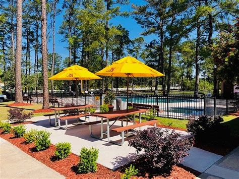 Koa savannah ga. Up to 6 people. 30/20 Amps. Individual Tent Site. Water & Electric. Sand. Pets Allowed. Save 10% at check out with KOA Rewards. Deluxe Tent sites have a raised 12ft X 12ft, level tent pad with a nice built in fire pit and grill on site. They are set along the lake for a relaxing experience and an amazing view of our water fowl. 