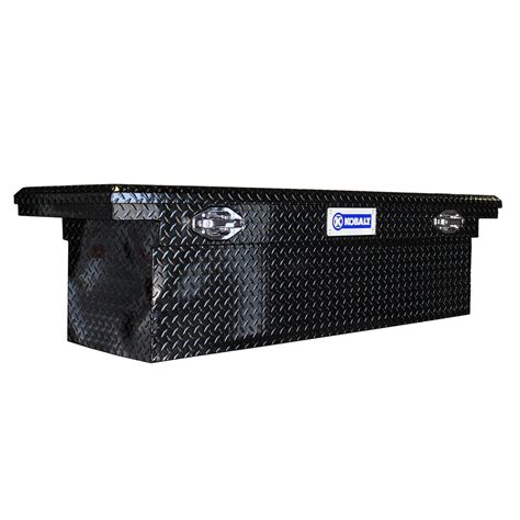 Full-size truck tool box provides enough storage space for all your hammers, saws and screwdrivers. Black powder-coated aluminum construction with diamond tread plate is abrasion-resistant and rust-proof. 69-in L x 19-in W x 18-in H . 
