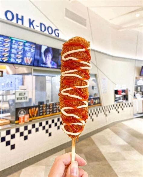 Korean corn dog nyc. A classic Korean corn dog consists of thickly battered and chewy dough with a sausage inside and is sprinkled with sugar and drizzled with ketchup and mustard. 