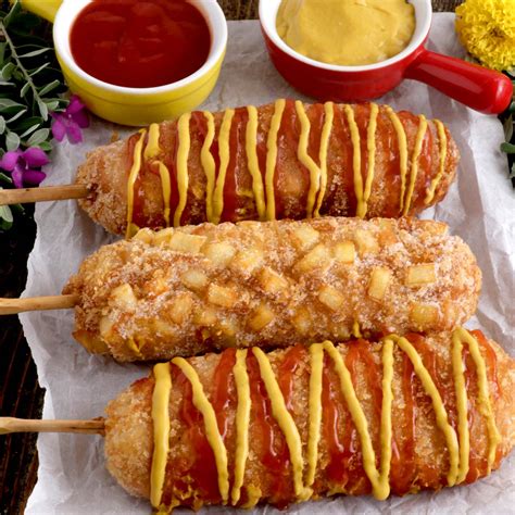 Korean corn dog visalia. Dip and coat skewered cheese sticks with the cold batter. Make sure to cover all around. Now, lightly and quickly coat with panko bread crumbs then carefully place into frying oil. Fry for 5 minutes or until golden brown out side. Remove form oil, place on a cooling rack or paper towel lined baking sheet. 