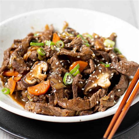 Korean meat bulgogi. 1. Cut your chuck roast into bite-sized pieces and cut off any excess fat. Add the grated Asian pear, 4 cloves of minced garlic, 1 tbsp grated ginger, 1/3 cup soy sauce, 2 tbsp brown sugar, 2 tbsp gochujang and 1/2 a white onion sliced. Marinate for up to 24 hours if you have time, if not move on to the next step! 2. 