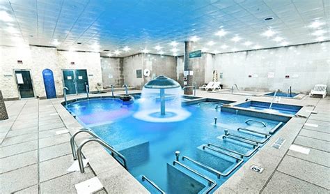 Your daily admission pass includes access to: Locker Room & Steam Rooms. Saunas & Base Rock Room. Outdoor & Indoor Bade Pools. Jacuzzis & Cold Plunge Pool. Media Room & Indoor Lounges. Your pass also includes: Spa uniforms (all sizes available. Must be worn during your visit). 