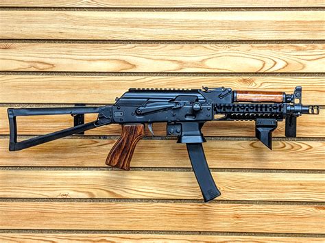 Kr9 vs kp9. The KR-9 SBR is a US manufactured 9mm semi-automatic AK style rifle. It is based on the Russian Vityaz-SN submachine gun, has a 9.25” barrel and accepts 30 round double stack Kalashnikov USA™️ magazines (10 round magazines are available). KR-9 SBR comes with a skeletonized style metal side folding stock, hinged top cover with attached ... 