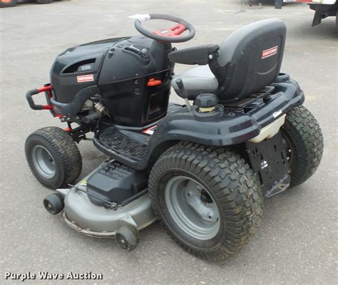 1. Husqvarna YTH24V48 Riding Mower. I put the YTH24V48 at number one for a few reasons. Before I get into that, I just want to highlight the naming convention here. The 24 means it is a 22 HP engine and the 48 means it has a 48 inch wide cutting deck. Yes, that is a four foot wide cutting deck on a riding mower.. 