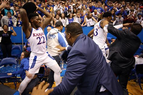 A violent brawl erupted between in-state rivals at a college basketball game in Kansas Tuesday night. Benches were cleared and punches were thrown in the fin.... 
