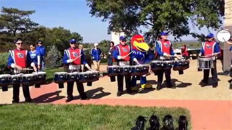 KU Drumline The KUMU Approach to Battery Percussion :: Online Clinic #1 The percussion staff reviews fundamental approach, grip, basic strokes, heights, and some exercises in part 1 of Kutztown University Marching Unit's Online Marching Percussion Instructional Series.