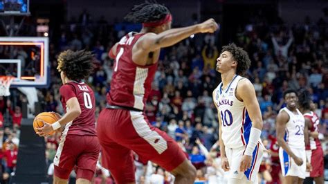 After leading by as many as 12 with 15 minutes left to play, Kansas faltered down the stretch to suffer a 72-71 loss to Arkansas in the Round of 32 on Saturday at …