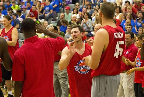 The 6-foot-4, 39-year-old 2005 University of Kansas graduate showed off his soft, left-handed shooting touch, hitting five threes while exploding for 30 points in the Red team’s 105-104 victory over the Blue squad in the 15th-annual Rock Chalk Roundball Classic KU basketball alumni game.. 