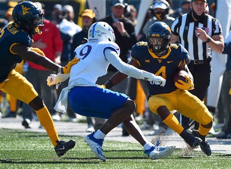 The Mountaineers Now staff predicts Saturday's game. Christopher Hall: West Virginia 37 Kansas 20. Kansas is coming off a 56-10 thumping of Tennessee Tech last week while West Virginia suffered an .... 
