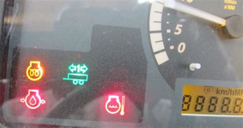 There are a variety of symbols that may be found on the dashboard of a tractor. Here is a list of some of the most commonly used characters and their meanings: Battery Symbol: Indicates that the tractor’s battery is either on or off. Temperature Gauge: This signifies the engine’s temperature and can indicate if it’s running too hot or cold.. 