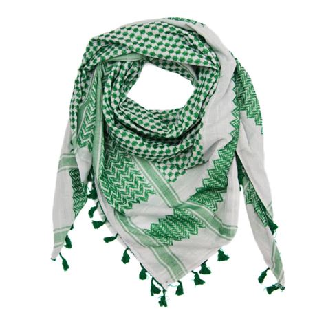 Kufiya.org - Discover the timeless elegance of the classical Black and White Kufiya, the only one of its kind made in Palestine. This iconic Kufiya, also known as “Keffiyeh,” is deeply rooted in Palestinian heritage. Originally worn by the rural farming community, it became a symbol of resistance during the 1930s revolt against British Colonialism.