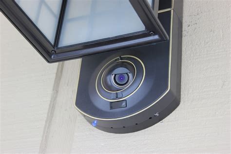 Kuna Camera Porchlight is a device that combines a light fixture and an outdoor camera with the power of Kuna, a smart home platform. You can control the light and camera with your mobile device, and get features like package tracking, motion detection, and smart home control..