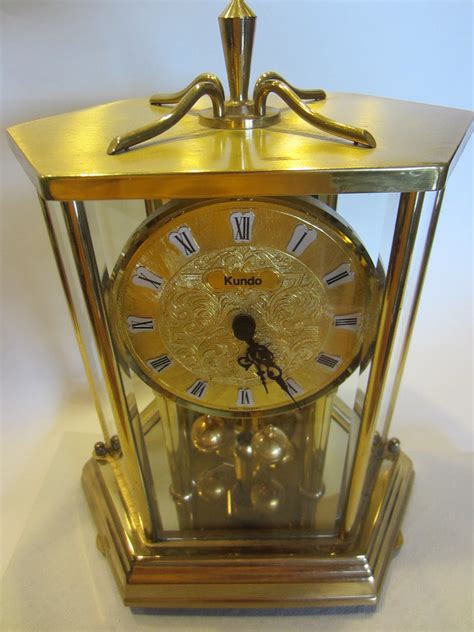 Lovely vintage Kundo 400-Day Torsion Clock - German Anniversary Mantel Clock (18) $ 245.72. FREE shipping Add to Favorites 5 Kundo ORIGINAL 60 year old 400 day anniversary clock $ 405.00. FREE shipping Add to Favorites RARE Hermle 400 Day Anniversary Clock Brass & Glass Dome vintage Germany Antique ...