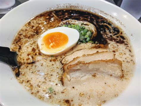 Kuro ramen. Japanese people eat many kinds of food, but popular choices are white rice, miso soup and pickled vegetables alongside fish or meat. Ramen noodles in a bento is characteristic of l... 