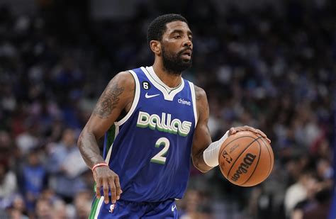 Kyrie Irving agrees to stay with Mavs, Doncic on a $126 million, 3-year deal, AP source says