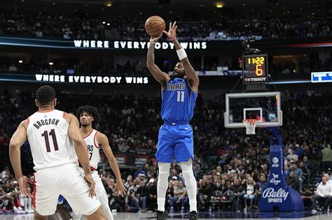 Kyrie Irving scores 24 with Luka Doncic out, Mavs finish sweep of Blazers with 139-103 win