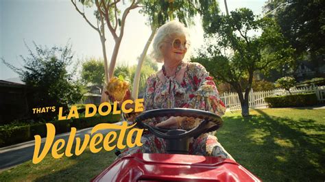 The brand updated its logo and launched a new ad campaign, La Dolce Velveeta, to support the change. Someone eats ice cream out of an ice cream cone in the La Dolce Velveeta commercial. Velveeta. 