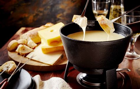 La fondue. A classic cheese fondue recipe that is easy and sure to impress guests. Includes tips for making smooth fondue, the best cheeses, dippers and more! 