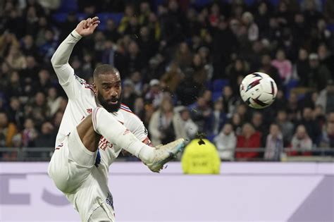 Lacazette helps Lyon push for European spot as he battles Mbappé for top scorer