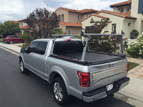 Ladder rack with tonneau cover. The Yakima OverHaul HD Adjustable Truck Bed Ladder Rack for Tonneau Cover # Y01151-5755 includes the brackets, uprights, and bars, to install the OverHaul HD on the rails of your truck bed. These parts are for the installation of the ladder rack and do not include any hardware for the tonneau cover itself. With the hardware provided, it allows ... 