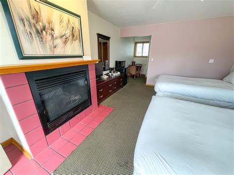 Lake bluff inn and suites. This air conditioned fully carpeted room includes two full beds, bathroom with tub/shower, small refrigerator, coffee maker and microwave. 