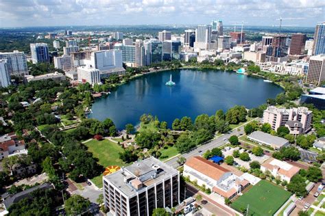 Lake eola park orlando fl. Lake Eola Park is located in the heart of Downtown Orlando. The sidewalk that circles the lake is 0.9 miles in length, making it easy for visitors to keep track of their walking or running distances. Other activities available to park visitors include renting swan-shaped paddle boats, feeding the live swans and other birds inhabiting the park, seeing a concert or a play in the Walt Disney ... 