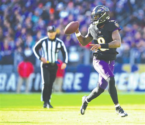 Lamar Jackson’s perfect day clinches top seed in AFC for Ravens, fuels rout of Dolphins