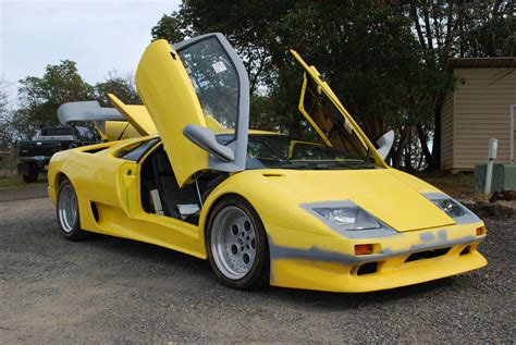 This 1993 Lamborghini Diablo VT is a first-year AWD model powered by a 5.7L V12 and dog-leg 5-speed manual. The VT could accelerate to 60 in about 4.5 seconds and could achieve speeds up to 203mph when new. The original invoice for the car is included, showing a total cost of 260 million lira.