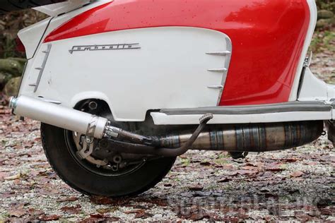 Lambretta quattrini exhaust.  Retro &lsquo;mod&rsquo; pieces sit alongside shar...