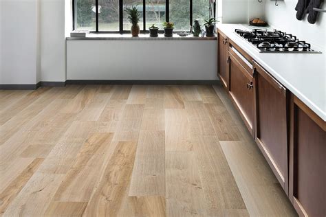 Laminate flooring waterproof. Vinyl plank flooring is waterproof and safe to use in a bathroom or laundry room. This type of flooring is commonly used in the kitchen area as well as dining rooms and mudrooms. V... 