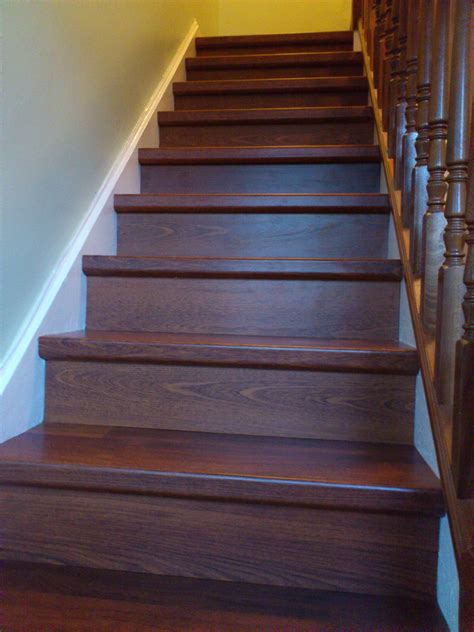 Laminate stairs. Stair Treads Are Eased. One reason is that carpet eases the stair tread's edge. Carpet materials such as olefin and polyester are slippery. Carpeting creates a softened curve on the nose of each stair. Typically, this sharp edge helps to provide grip. But when carpet blunts that edge, your foot cannot grip as well. 