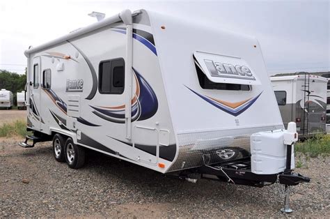 Featuring a spacious dry bath, more kitchen counter space, Lance's awesome dinette "Super-Slide" and forward queen-sized bed, the 1685 is our shortest dual axle travel trailer. With the Four Seasons Comfort Technology package standard, refined comfort and luxury are all within your reach! Make the 1685 your base camp!. 