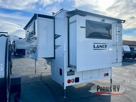 Lance camper models.  This compact truck camper bumper features a sleek con...