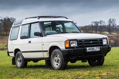 First introduced in 1989, the Land Rover Discovery was designed to bridge the gap between the rugged off-road capabilities of the Land Rover Defender and .... 