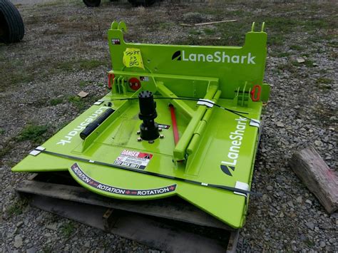 Lane Shark LS-3 FEL Mounted Brush CutterShark LS-3 Specifications: Hydraulic Flow Range: 5-8.5gpm. Weight: 320lbs. Dimensions: 34″Lx34″Wx29″H. Cutting Diameter: 32″.. 