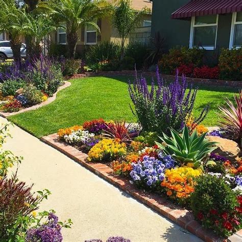 Landscaping flower beds. This flower bed uses gentle curves to create a shape that naturally draws the eye to the entryway and makes the space feel more welcoming. To achieve this look, lay out a garden hose to outline ... 