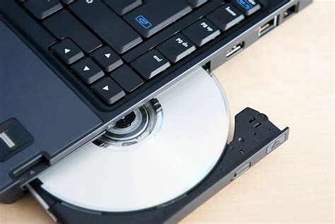 Laptops with disc tray. Restart the computer to the BIOS and while in the computer BIOS, press the EJECT button on the computer. NOTE: If the drive tray ejects in BIOS, but not in the operating system, reinstall the CD, DVD or Blu-ray Disc driver . If this is an external CD, DVD or Blu-ray Disc drive, confirm that the drive is properly connected. 