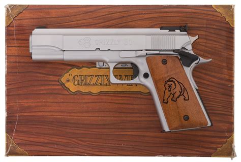 Lar grizzly. LAR Grizzly 50 Mark V Semi-Automatic Pistol with BoxFixed blade front and adjustable rear notch sights, extended slide catch, short serrated trigger, extended thumb safety, serrated short spur hammer, beavertail grip safety, and checkered mainspring housing. With original box and three extra magazines. 