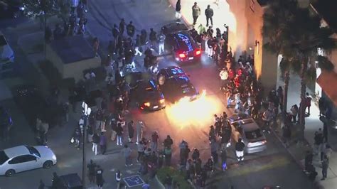 Large crowd, cars burning rubber takeover Rosemead shopping center