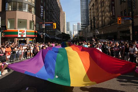 Large crowds pack Toronto streets as Canada’s largest Pride parade begins