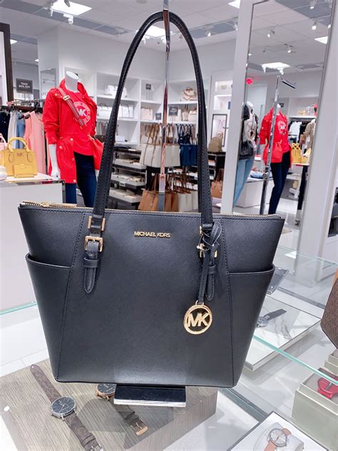 Dec 5, 2023 · Jet Set Large Logo Crossbody Bag. $398 to $79. Color POPPY. KORSVIP. You could earn +790 points with this purchase. Join Now. Sold Out. 
