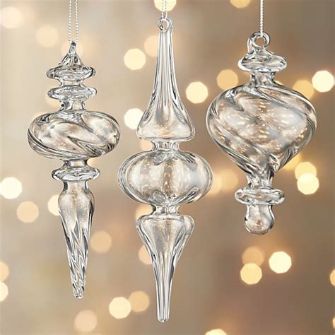 Round out your tree d&eacute;cor with this Merry Christmas Striped Ball Ornament. This glass ornament is in the shape of a sphere and features a white and black striped background. The phrase &ldquo;Merry Christmas&rdquo; sits on the front in large metallic gold font. Use the attached loop to add your own hook or string!. 