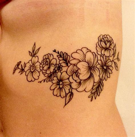 Scarlet Poppy Tattoo Design On Back. This solo poppy flower ta