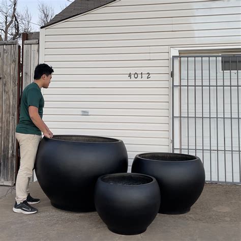Large round fiberglass planters.  How to use large in a sentence.  Its cle...