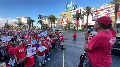 Las Vegas food service workers demanding better pay and benefits rally on the Strip