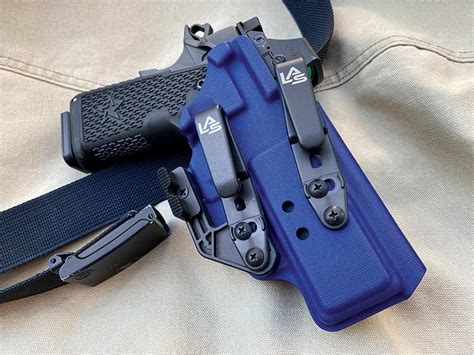 This is to maximize concealment and help fight what is called "spill over." This happens when the top portio LAS Concealment Shogun Glock 48 Right Hand Kydex Holster Black BDU. 